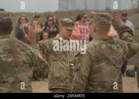 The Idaho Army National Guard’s  B Company, 2-116th Combined Arms Battalion took some time during their field training this week to invite family members to the Orchard Combat Training Center.     During the family visit, B Company Commander Capt. Jeff Dahl administered reenlistments and promotions for several B Company soldiers. Stock Photo