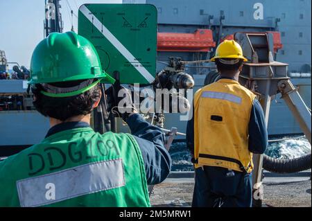 220327-N-UP745-1206 EAST MEDITERRANEAN SEA (March 27, 2022) Arleigh Burke-class guided-missile destroyer USS Jason Dunham (DDG 109) receives a fuel probe from Henry J. Kaiser-class replenishment oiler USNS Laramie (T-AO-203) during a replenishment-at-sea, March 27, 2022. Jason Dunham is a part of the Standing NATO Maritime Group Two (SNMG2), one of four standing forces that comprise the maritime component of the Very High Readiness Joint Task Force (VJTF), on a scheduled deployment in the U.S. 6th Fleet area of operations in support of maritime security operations as well as continued cooperat Stock Photo