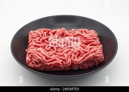 Fresh pork and beef minced meat isolated on white background. Stock Photo