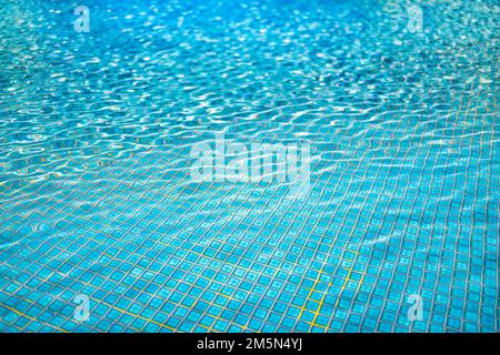 Beautiful relaxing swimming pool water sun reflection background. Ripple water texture background, natural sunlight. Abstract artistic water surface Stock Photo