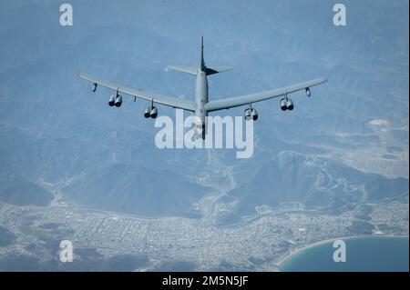 A U.S. Air Force B-52H Stratofortress flies above the Arabian Gulf, March 29, 2022. The bomber’s flight originated at Royal Air Force Fairford, England, and flew over the East Mediterranean, Arabian Peninsula, and Red Sea before departing the region. Stock Photo