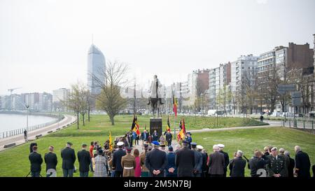 A group of multinational observers and spectators lay witness to a tribute ceremony at the equestrian statue of Albert I in Liège Belgium to commemorate the resistance of German invaders during World War I, Mar. 29, 2022. Germany invaded the neutral country of Belgium after declaring war on France in an effort to deny a French fortification along the French-German border. The ceremony paid homage to King Albert I who personally led his soldiers into battle to secure the continued existence of the Belgian state. (DoD photo by Tech. Sgt. Daniel E. Fernandez) Stock Photo