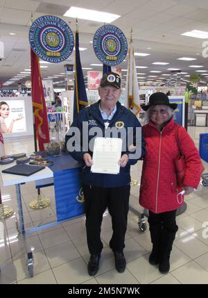 NEX Annapolis, Maryland, honored Vietnam War Veterans with a lapel pin on March 29, National Vietnam War Veterans Day. The Navy Exchange Service Command (NEXCOM) is comprised of 16,000 personnel worldwide facilitating seven business lines: NEX retail stores, Navy Lodge Program, Navy Gateway Inns & Suites, Ships Store Program, Navy Clothing and Textile Research Facility, Uniform Program Management Office and Telecommunications Program Office. (U.S. Navy photo) Stock Photo