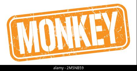 MONKEY text written on orange grungy stamp sign. Stock Photo