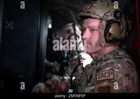 Staff Sgt. Anthony Henderson, 607th Air Support Operations Group Tactical Air Control Party personnel, awaits landing at Pilsung Range, Republic of Korea, March 30, 2022. Henderson was one member of the team assembled to demonstrate the full capabilities of lethal targeting to Lt. Gen. Scott Pleus, Seventh Air Force commander, during a battlefield circulation. Stock Photo