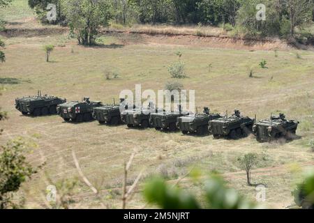 U.S. Army infantrymen with the 4th Battalion, 23rd Infantry Regiment, 2nd Stryker Brigade Combat Team, 7th Infantry Division, Stage their vehicles in preparation to train members of the 112th Infantry Regiment, Royal Thai Army, on the M1129 Stryker Mortar system as part of Cobra Gold 2022 in the Lopburi Province of the Kingdom of Thailand, Feb. 26, 2022. CG 22 is the 41st iteration of the international training exercise that supports readiness and emphasizes coordination on civic action, humanitarian assistance, and disaster relief. From Feb. 22 through March 4, 2022, this annual event taking Stock Photo