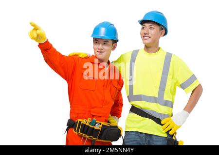 Two young men construction workers Stock Photo