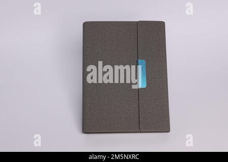 gray color fabric and leather customized diary stock image Stock Photo
