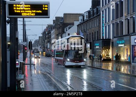 Edinburgh, Scotland, UK. 30th December 2022. The Forecasted severe rain warning hits the city centre overnight with torrential rain and localised flooding causing difficult conditions for motorists and pedestrians. Bus in Princes Street. Credit: Craig Brown/Alamy Live News Stock Photo