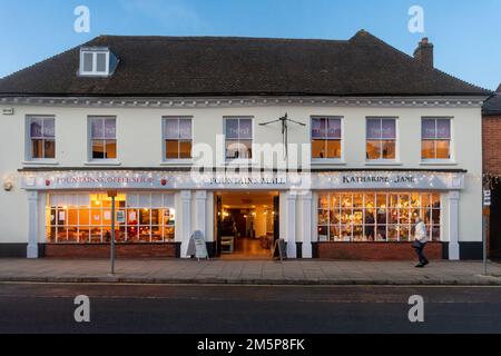 Christmas lights at dusk in Odiham High Street, a Hampshire village, England, UK, at dusk during December. Fountains Mall. Stock Photo