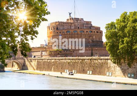 Castel Sant’Angelo in Rome, Italy. Scenic view of medieval castle of Sant’Angelo, sun in summer. Scenery of famous Roman monument, old landmark of Rom Stock Photo