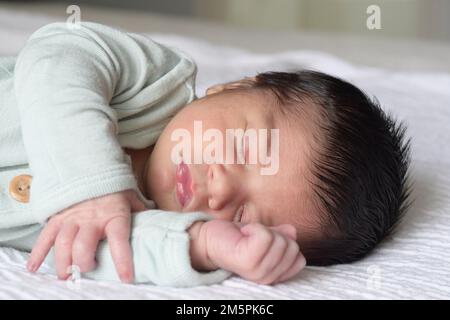 Newborn sleeping Stock Photo