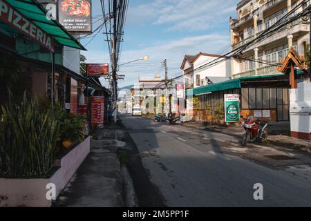 Chiang Mai, Thailand. November 18, 2022. Quiet street with shops and restaurants in Chiang Mai Stock Photo