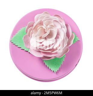 Pink decorated round gift box isolated on white. Stock Photo