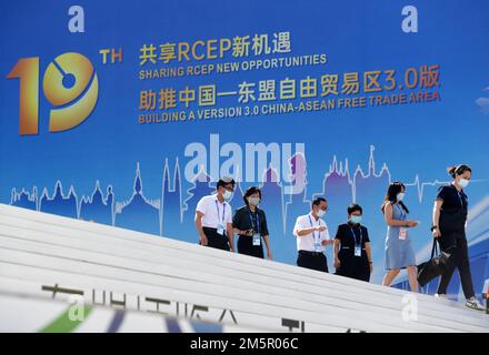 (221230) -- BEIJING, Dec. 30, 2022 (Xinhua) -- Participants walk outside the Nanning International Convention and Exhibition Center, the venue of the 19th China-ASEAN Expo and the China-ASEAN Business and Investment Summit, in Nanning, south China's Guangxi Zhuang Autonomous Region, Sept. 16, 2022. The expo spotlighted the theme of 'Sharing RCEP New Opportunities, Building a Version 3.0 China-ASEAN Free Trade Area.' Xinhua's top 10 world news events in 2022 RCEP takes effect, sending strong voice of Asia on integration The Regional Comprehensive Economic Partnership (RCEP) officially en Stock Photo