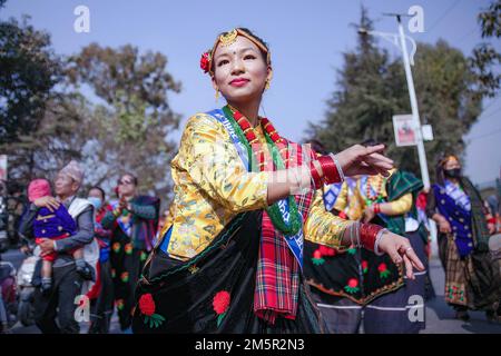 Kathmandu, Nepal. 30th Dec, 2022. A Gurung community girl wearing traditional attire seen singing and dancing as she celebrates the Tamu Loshar festival. Every year in the Nepali month of Poush (December), people from the Gurung community celebrate Tamu Lhosar/ their new year with respect to their own calendar system called Tamu Sambit with great enthusiasm. Credit: SOPA Images Limited/Alamy Live News Stock Photo