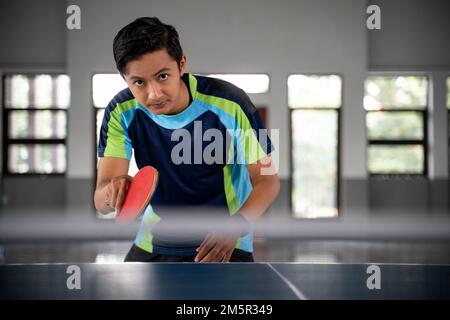 close up of a male player in a position ready Stock Photo