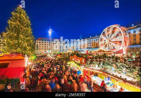 Dresden, Germany - December 2016: Beautiful Christmas Market  Striezelmarkt in Dresden, historical Saxony. Christmas fair, European traditions. Stock Photo