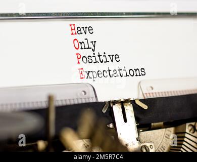 HOPE have only positive expectations symbol. Concept words HOPE have only positive expectations on typewriter on beautiful white background. Business Stock Photo