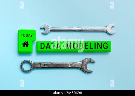 Text caption presenting Data Modeling. Conceptual photo process of transferring data between data storage systems Stock Photo