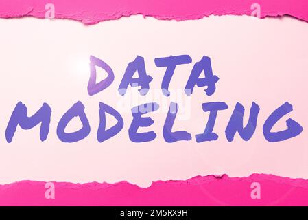Writing displaying text Data Modeling, Word for process of transferring data between data storage systems Stock Photo