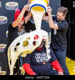 Charlotte, NC, USA. 30th Dec, 2022. Maryland Terrapins head coach Mike Locksley gets doused in mayonnaise after winning the 2022 Duke's Mayo Bowl at Bank of America Stadium in Charlotte, NC. (Scott Kinser/CSM). Credit: csm/Alamy Live News Stock Photo