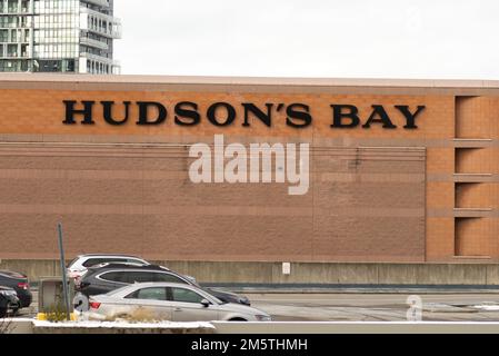 Toronto, ON, Canada – December 17, 2022: The logo and brand sign of Hudson's Bay Company. The Hudson's Bay Company is a Canadian retail business group Stock Photo