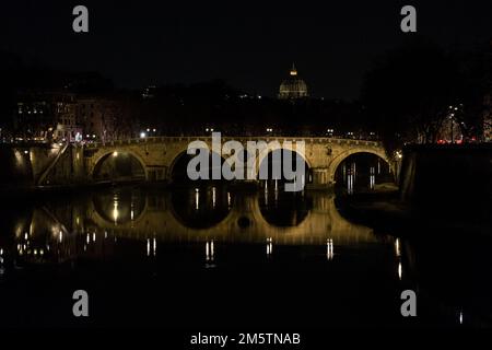 Rome, Italy. 30th Dec, 2022. This photograph shows the dome of St Peter's Basilica at night, seen from Ponte Garibaldi in Rome's historic center. The condition of former Pope Benedict XVI remains stable, the Vatican said on 30 December 2022, three days after revealing that the 95-year-old's health had deteriorated. - Benedict, who in 2013 became the first pope since the Middle Ages to step down as head of the worldwide Catholic Church, has been in poor health for many years. (Photo by Andrea Ronchini/Pacific Press) Credit: Pacific Press Media Production Corp./Alamy Live News Stock Photo