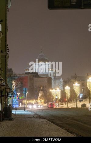 Moscow, Russia - December 27, 2022: Cold and deserted Moscow street on a snowy winter evening Stock Photo