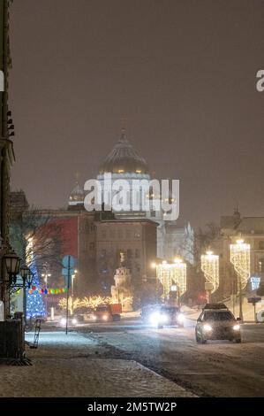 Moscow, Russia - December 27, 2022: Cold and deserted Moscow street on a snowy winter evening Stock Photo