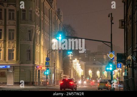 Moscow, Russia - December 27, 2022: Cold and deserted Moscow street on a snowy winter evening Stock Photo