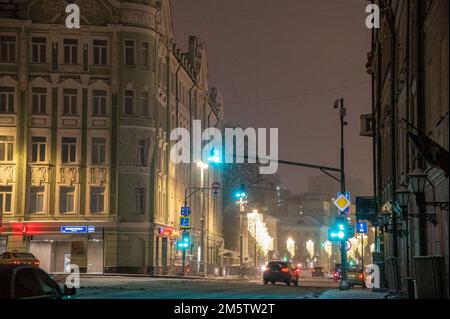 Moscow, Russia - December 27, 2022: Cold and deserted Moscow street on a snowy winter evening Stock Photo