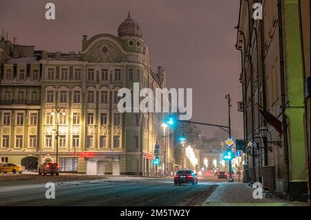 Moscow, Russia - December 27, 2022: Cold and deserted Moscow street on a snowy winter evening Stock Photo