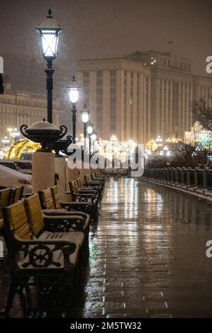 Moscow, Russia - December 27, 2022: Cold and deserted Moscow street on a snowy winter evening Stock Photo