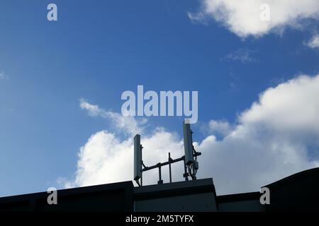 Australian mobile phone tower against blue sky Stock Photo