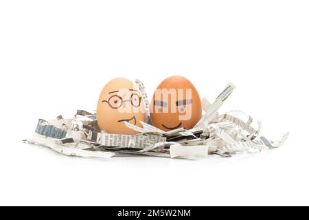 egg face glasses,thick eyebrows  on newspapers recycle. Stock Photo