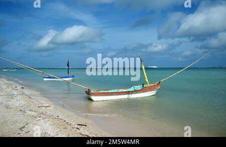 Fishing boat anchored on the coast, beach near the city of Progreso in the Gulf of Mexico Stock Photo