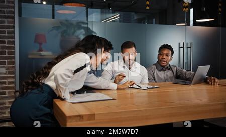 Diverse multiethnic employees coworkers partners in office multiracial business people team group work together brainstorm teamwork colleagues Stock Photo