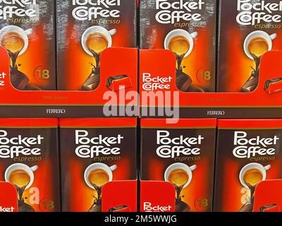 Viersen, Germany - December 9. 2022: Closeup of packs Ferrero pocket coffee candy in shelf of german supermarket Stock Photo
