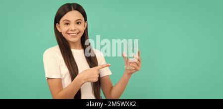 stay hydrated. kid hold glass of mineral water. child feel thirsty. Banner of child girl with glass of water, studio portrait with copy space. Stock Photo