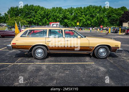 Iola, WI - July 07, 2022: High perspective side view of a 1977 Buick Century Station Wagon at a local car show. Stock Photo
