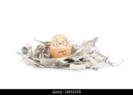 egg face glasses on newspapers recycle. Stock Photo