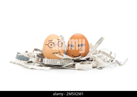 egg face glasses,thick eyebrows  on newspapers recycle. Stock Photo