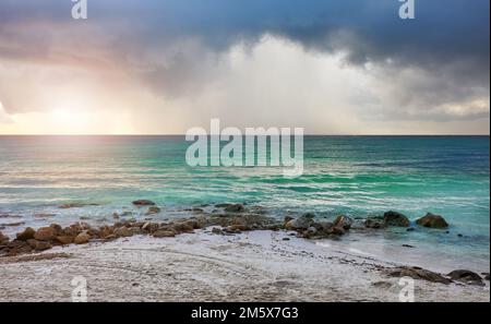 Empty Caribbean beach at sunrise. Stock Photo