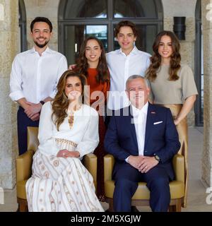 King Abdullah II and Queen Rania of Jordan and their children Crown Prince Al Hussein (1st from L), Prince Hashem (2nd from R), and Princesses Iman (1st from R), and Salma (2nd from L) pose in an undated photo released by the Royal Palace as this year’s end-of-year greeting photo, in Amman, Jordan, on December 31, 2022. Photo by Balkis Press/ABACAPRESS.COM Stock Photo