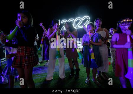 Manila, Philippines. 1st Jan, 2023. Revelers celebrate during a New Year's Eve party at a beach resort in Subic Bay Freeport, northwest of Manila, Philippines. January 1, 2023. (Credit Image: © Basilio Sepe/ZUMA Press Wire) Credit: ZUMA Press, Inc./Alamy Live News Stock Photo