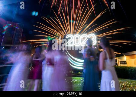 Manila, Philippines. 1st Jan, 2023. People watch a fireworks display as they celebrate during a New Year's Eve party at a beach resort in Subic Bay Freeport, northwest of Manila, Philippines. January 1, 2023. (Credit Image: © Basilio Sepe/ZUMA Press Wire) Credit: ZUMA Press, Inc./Alamy Live News Stock Photo