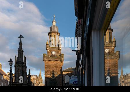 Forres, Moray, UK. 31st Dec, 2022. This shows the last of the sun hitting the high points and Tolbooth Clck Tower in the High Street. Credit: JASPERIMAGE/Alamy Live News Stock Photo