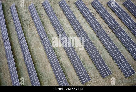Solar heat panels providing alternative energy to local village Stock Photo