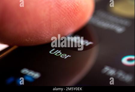 London. UK- 12.31.2022. The Uber application on the screen of a smartphone. Stock Photo